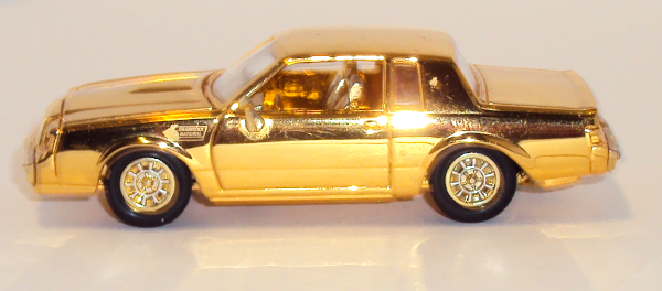small shiny GOLD car by Racing Champions
