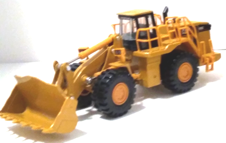 CAT 988G Wheel Loader - sandy yellow front view