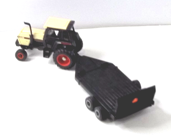 2294 Case Tractor with black farm implement trailer (left-above)