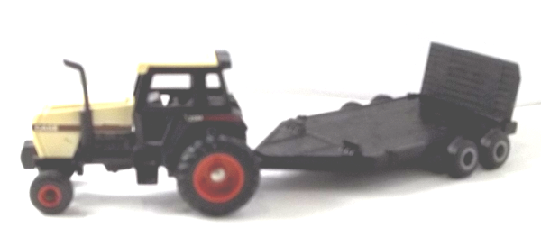 2294 Case tractor with black farm implement-trailer (left-view)