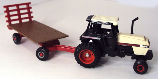 2294 Case Tractor with brown/red backrack flat trailer (right-side)