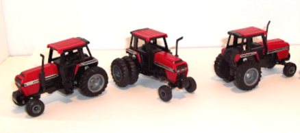 Three Case  IH 2594 tractors at various angles.