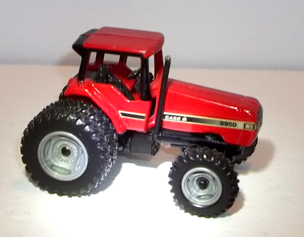 8950 Red Case IH  Fwa Magnum Tractor with dual rear wheels (viewed from right side)