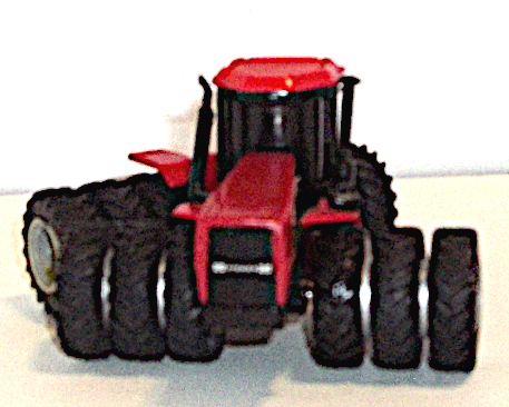 Case IH Steiger 9390 tractor with triple tires and tinted windows -front view