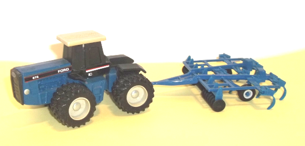 Blue Ford 876 tractor with blue harrow - (left side view)