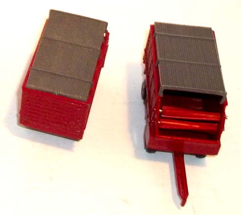 1:64 scale, (2) IH red forage wagons - seen from above, with grey toppers