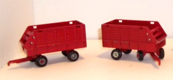 1:64 scale, (2) IH red forage wagons, right and left sides, no tops