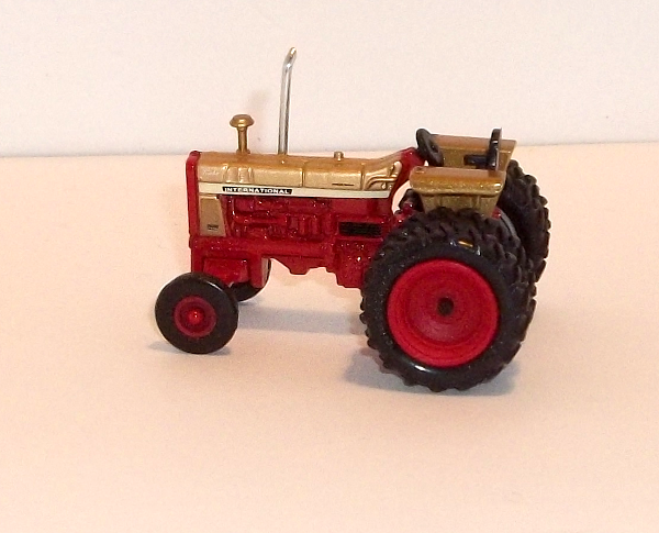 1456 Gold demonstrator Turbo IH Tractor with dual rear tires (left side) (no-Cab)