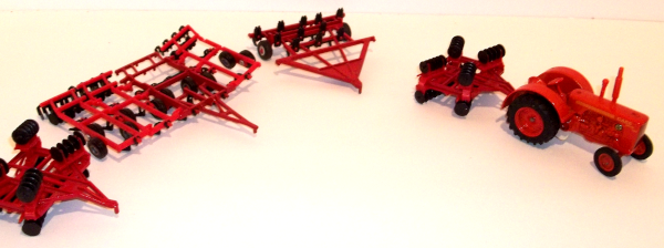 500 Case tractor with chisel plows and harrows with folding wings