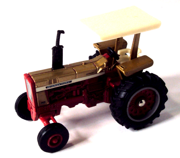 826 Gold Demonstrator IH Tractor with Canopy (left side)