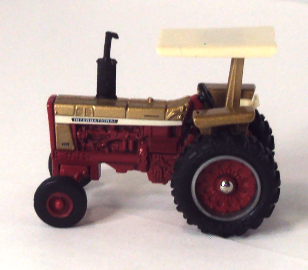 826 Gold Demonstrator IH Tractor with Canopy (left side)
