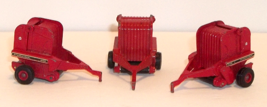 International Harvester vintage red 2400 hay balers (3) with marks of a play history as toys