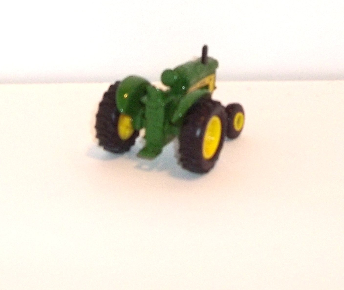 630 small John Deere row crop tractor (rear view)