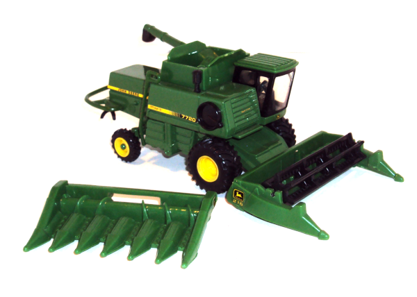 7720 John Deere combine/harvester Titan II with grain header plus corn header