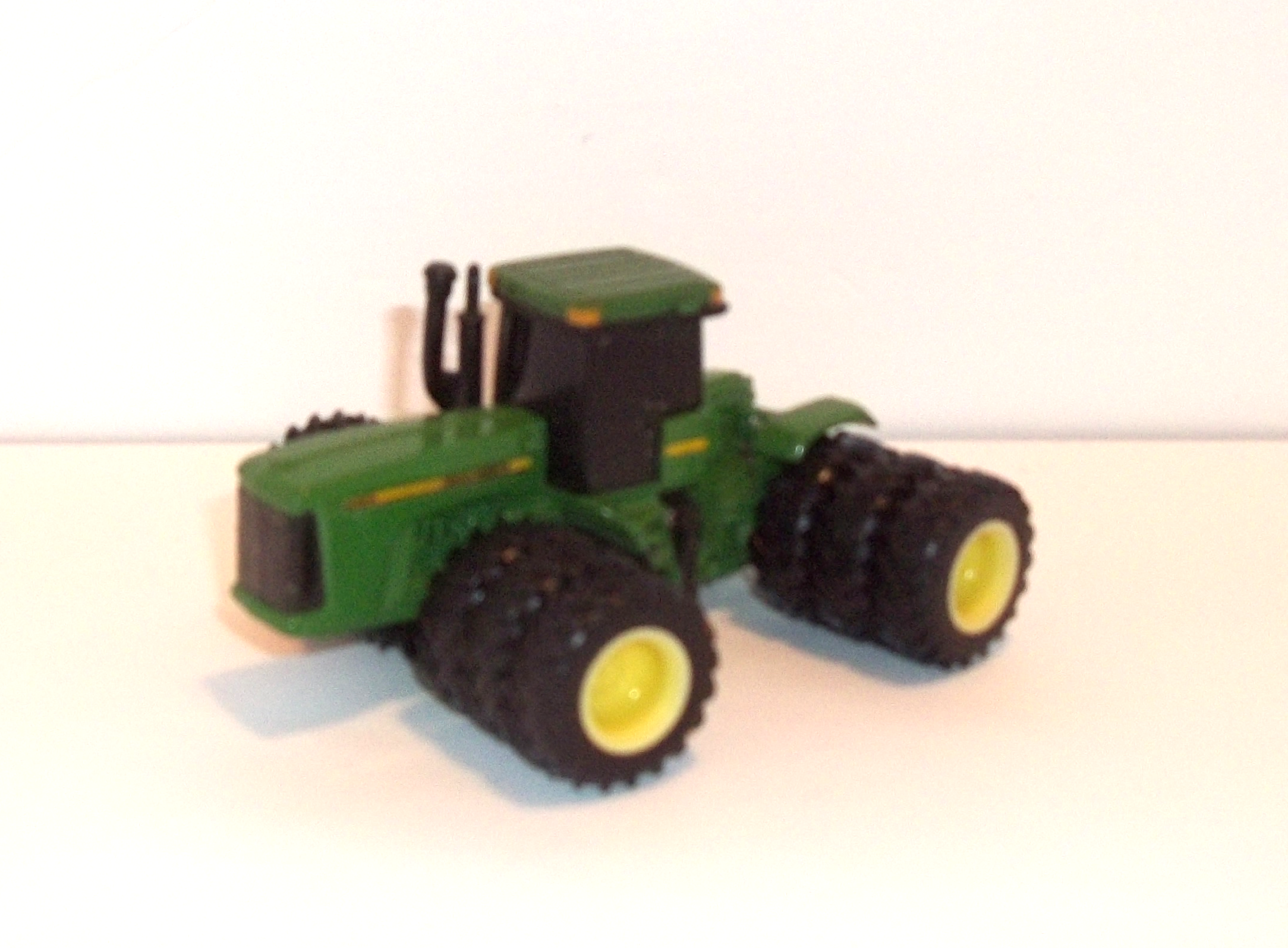 9400 John Deere 4WD tractor with tinted cab windows (left side view)