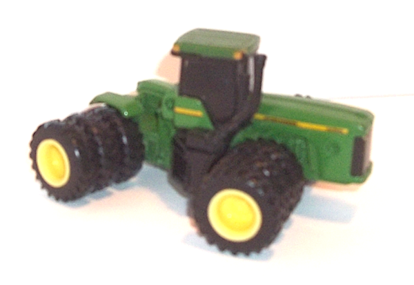 9400 John Deere 4WD Tractor, Triple tires, and  tinted cab windows (right-side view)
