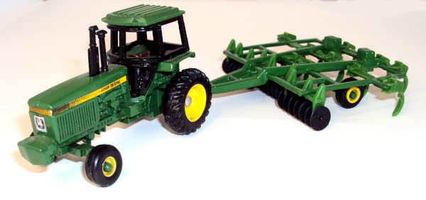 John Deere Tractor with Disc cultivator (left side)