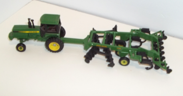 John Deere tractor with longer disc drill (viewed from above)