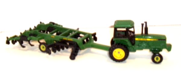 John Deere tractor with longer 2700 disc drill viewed right side