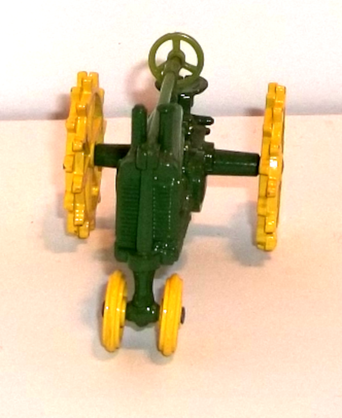Vintage John Deere tractor with yellow spoke wheels - viewed from above