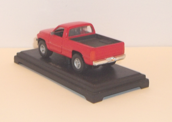 Maisto Red Dodge Ram Pickup truck - driver's side from the rear