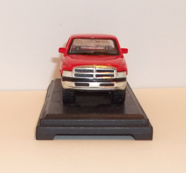 Maisto red Dodge Ram pickup truck straight on front view