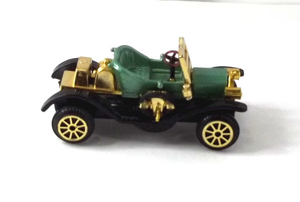green and gold open Ford Model T carriage